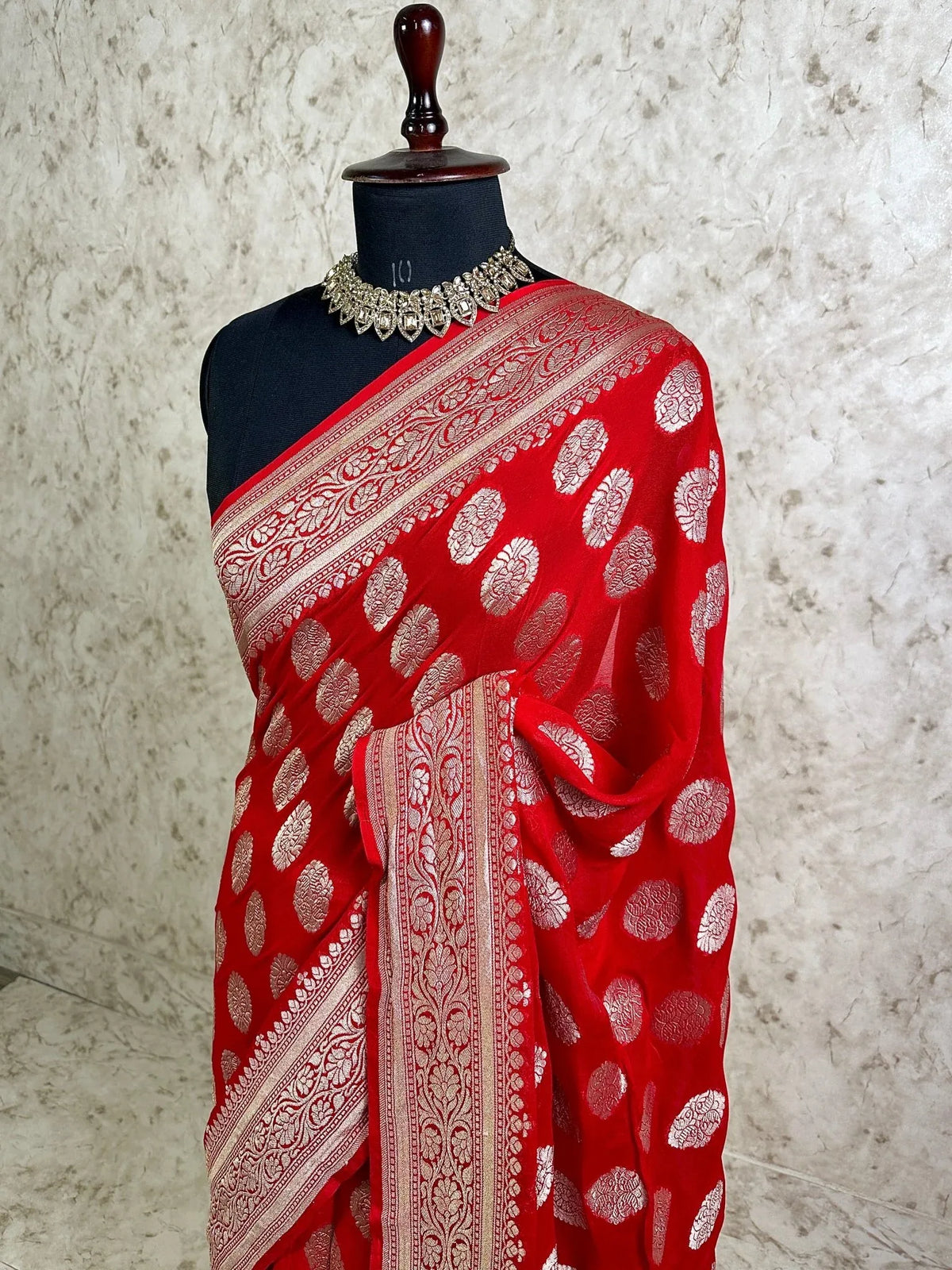 Crimson Red Khaddi Georgette Banarasi Saree with Silver Zari Buti and Ornate Floral Border - Katan Banaras