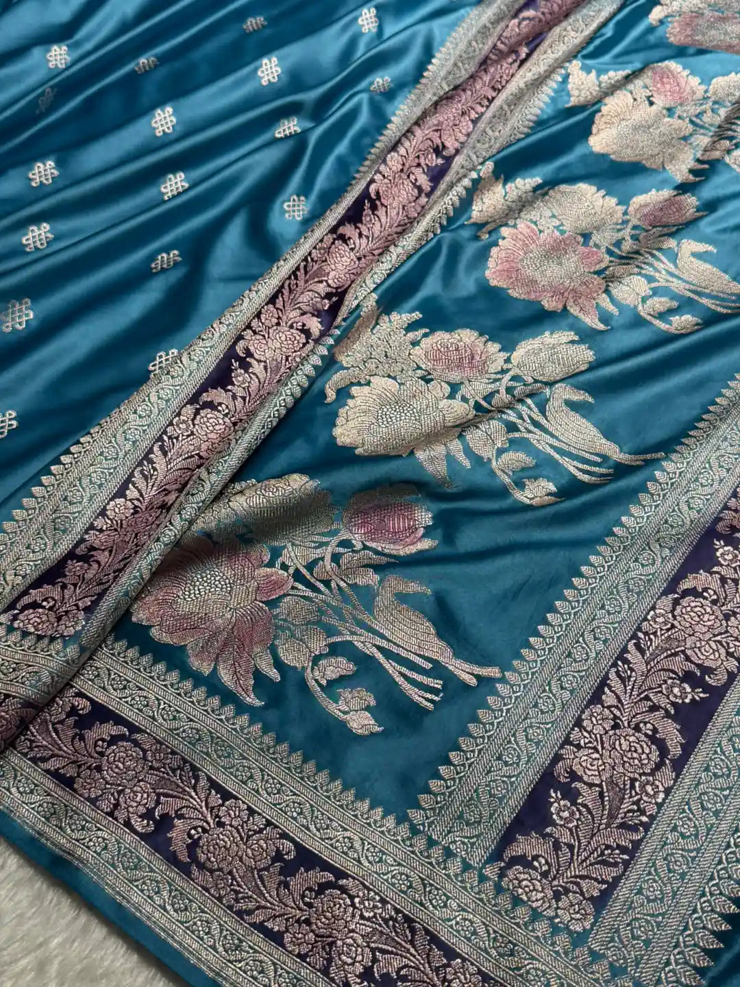 Dusty blue Mashru silk Banarasi saree with floral booti motifs and purple-toned floral border - Katan Banaras