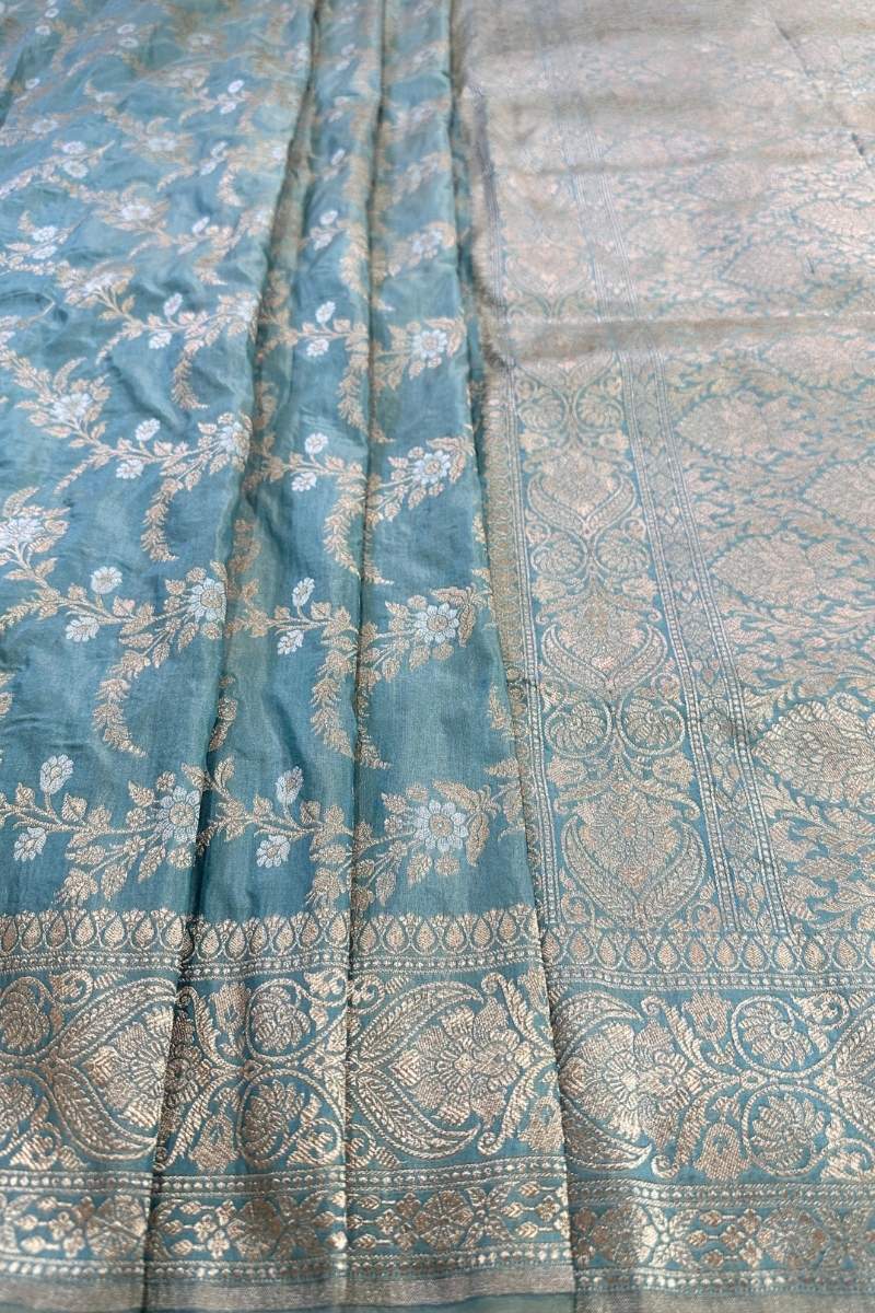 Luxurious Pastel Green Banarasi Silk Saree with Real Gold and Silver Zari