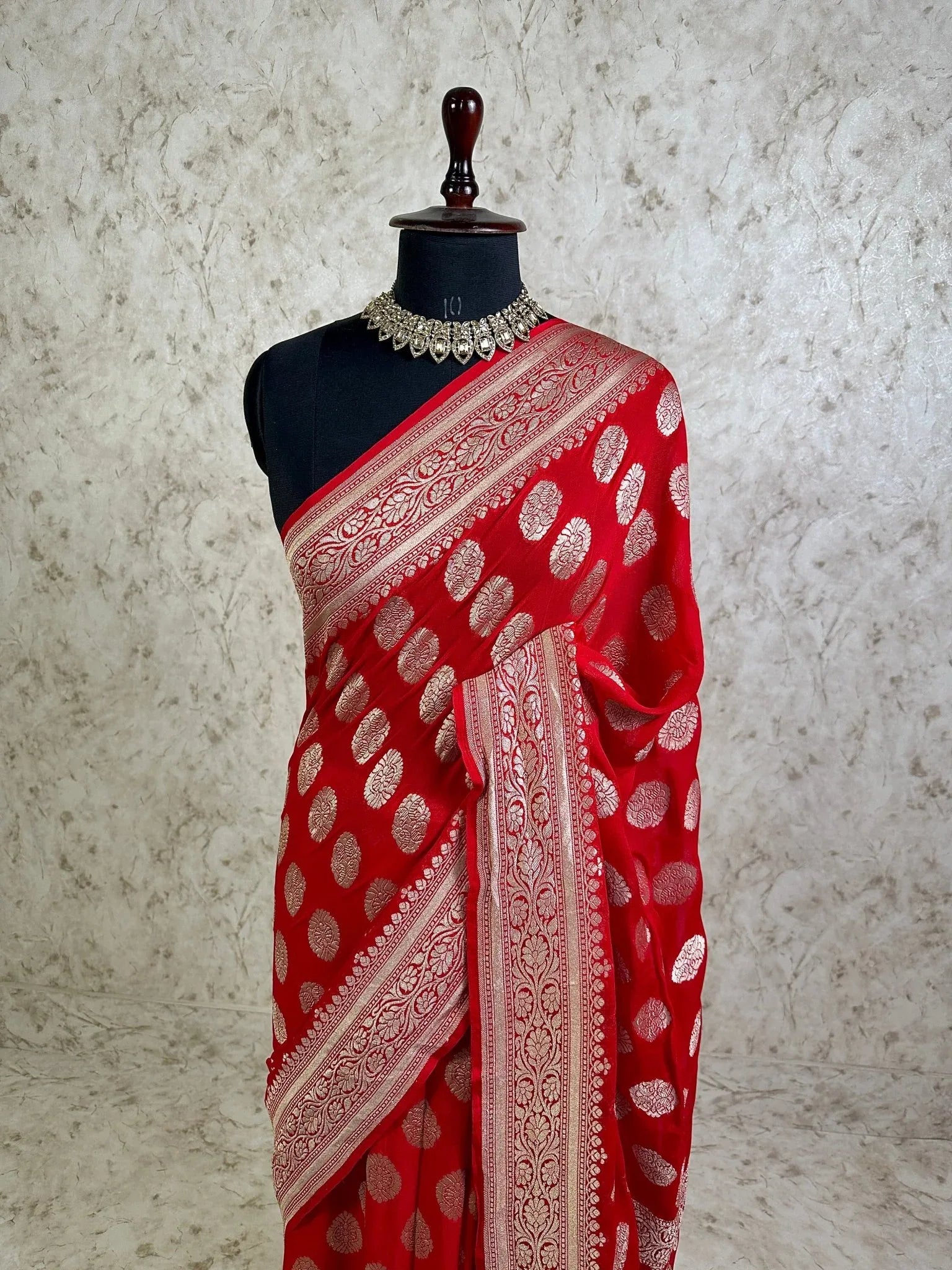 Crimson Red Khaddi Georgette Banarasi Saree with Silver Zari Buti and Ornate Floral Border - Katan Banaras