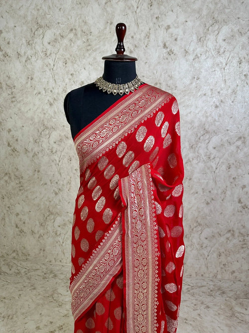 Crimson Red Khaddi Georgette Banarasi Saree with Silver Zari Buti and Ornate Floral Border - Katan Banaras