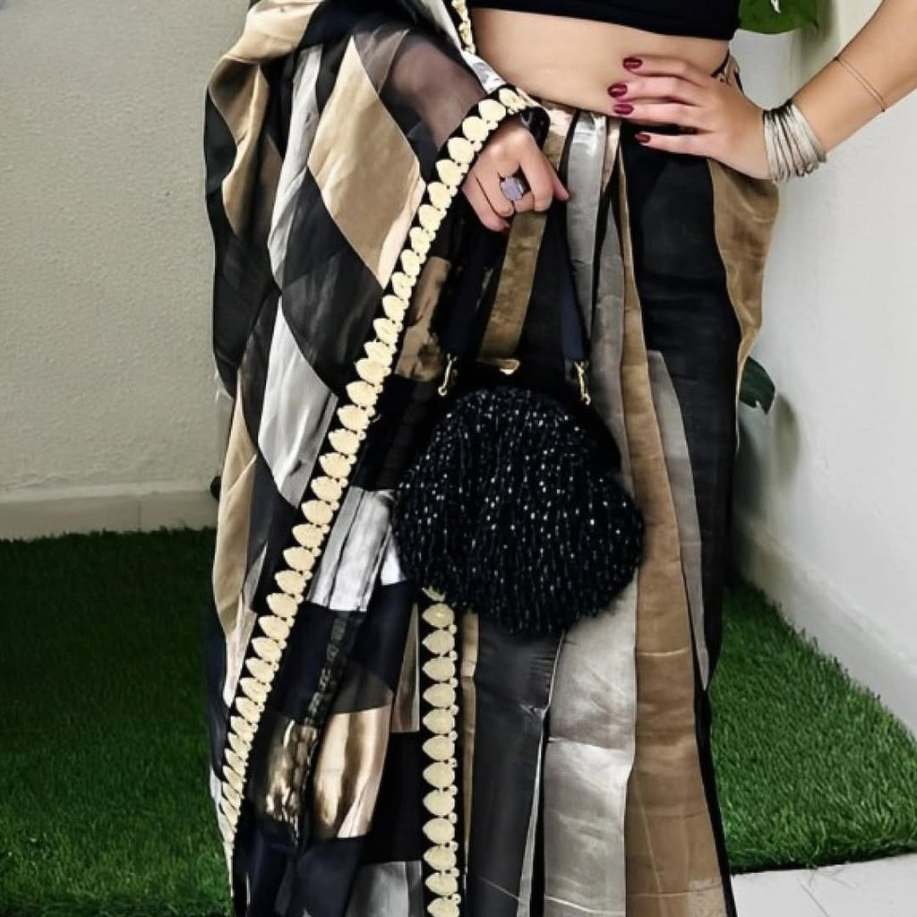 Authentic Banarasi silk saree with zari border, crafted by artisans in Varanasi.