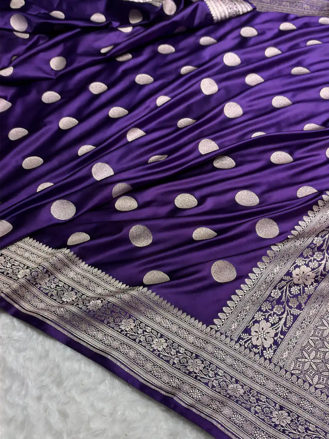 Deep-purple Mashru silk saree with polka-dot booti motifs, Jacquard Loom weave and gold zari border.