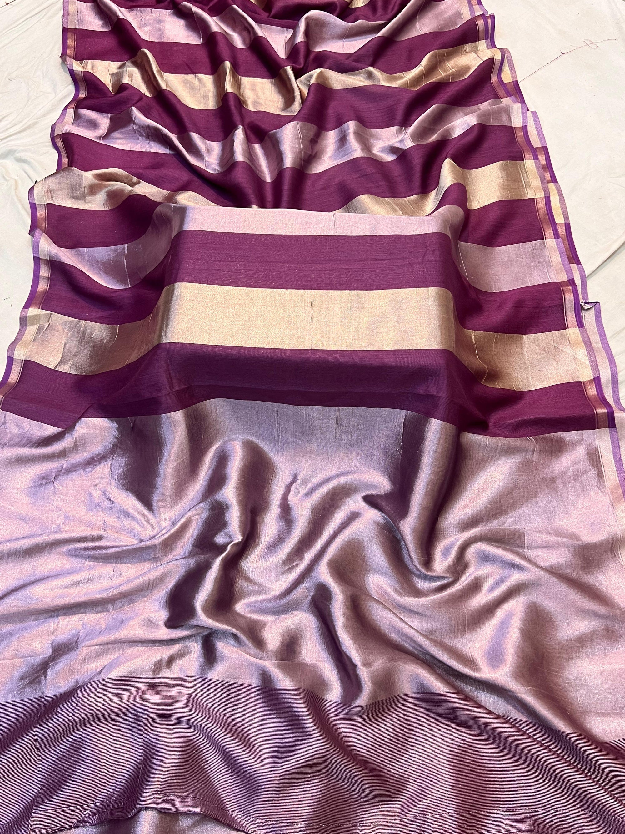 Detailed texture of Pure Moonga Silk fabric with traditional zari border work