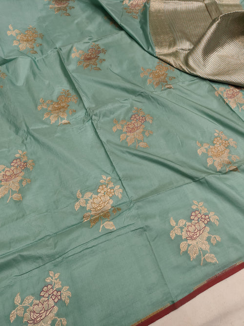Pure Katan Silk Minakari Banarasi Saree in pastel green with floral brocade work