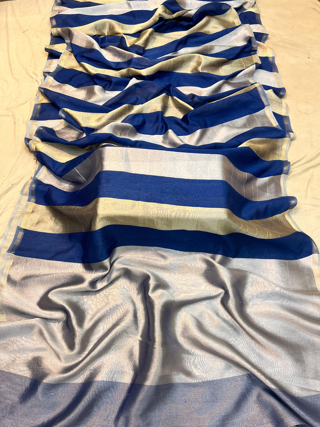 Pure Moonga Silk Banarasi Saree with Sona Rupa Zari, featuring traditional Uppada weaving technique