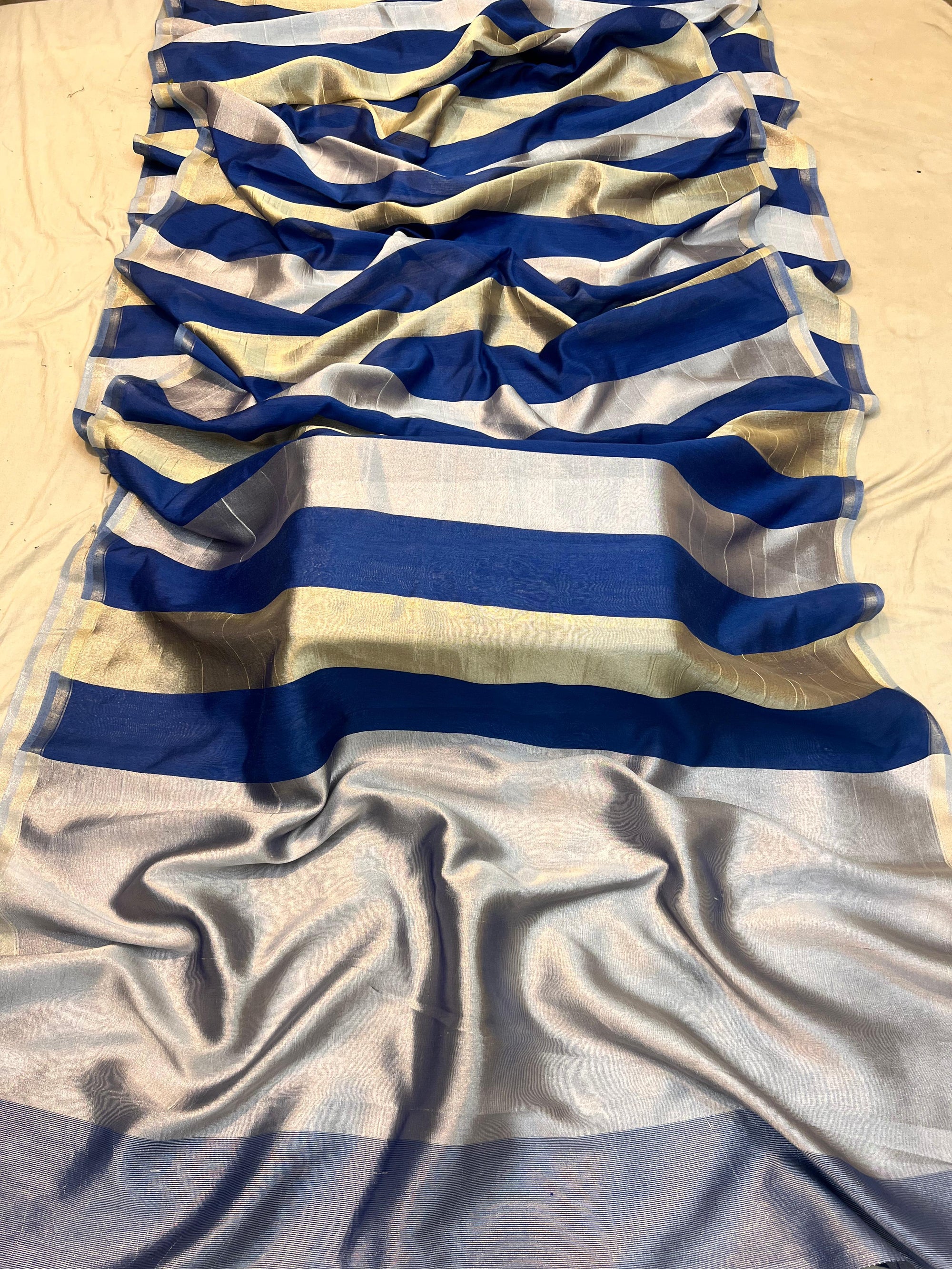 Pure Moonga Silk Banarasi Saree with Sona Rupa Zari, featuring traditional Uppada weaving technique